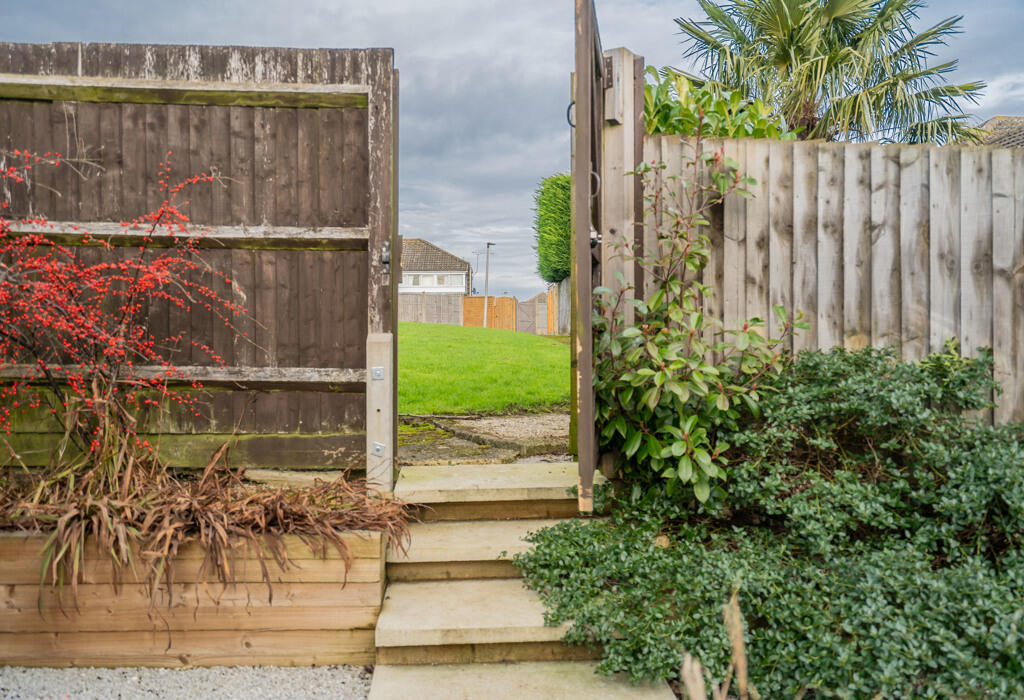 Gate to the field behind the home