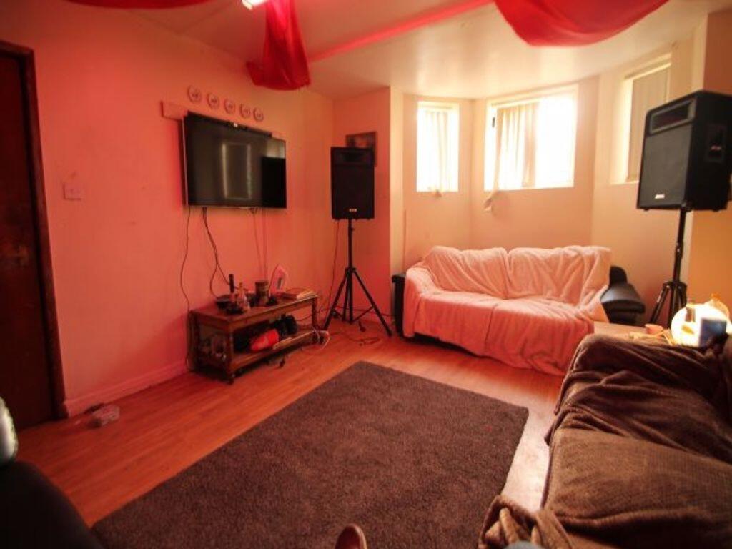 Cozy living room featuring comfortable seating,...