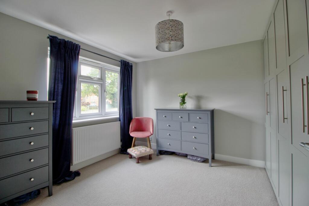 Bedroom Three with fitted wardrobes