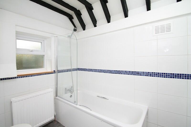 Bath with shower fac