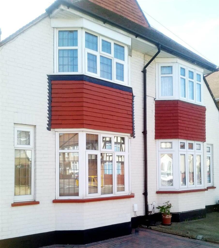 DOUBLE FRONT OF HOUSE PIC.jpg