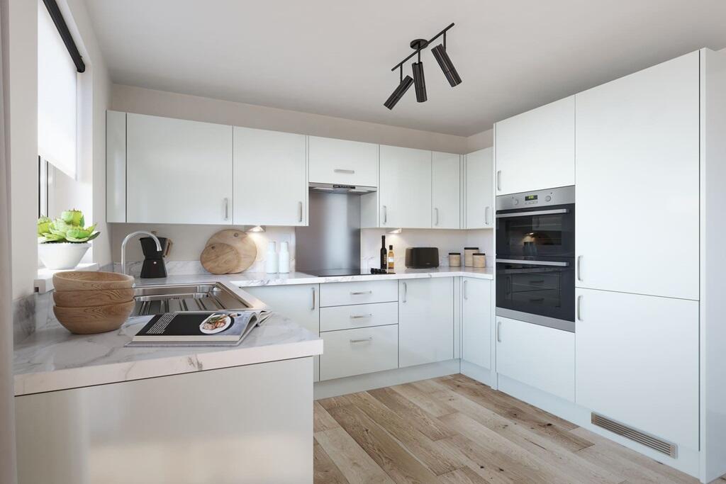 Modern three-sided kitchen with ample storage space