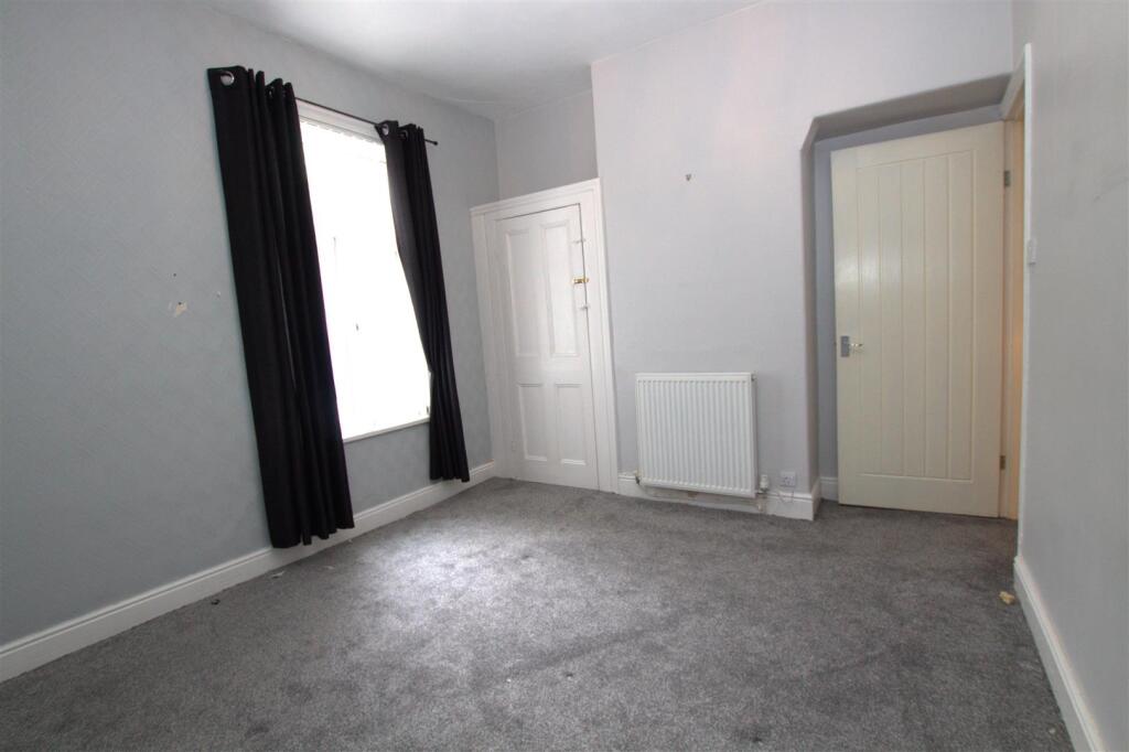 FRONT BEDROOM ANGLE 1.jpg