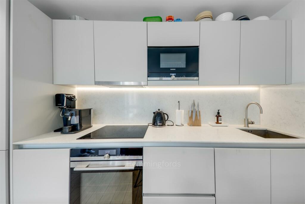 09-af6181778-JJ-HMF-Flat 12 Ann St-41-logo.jpg