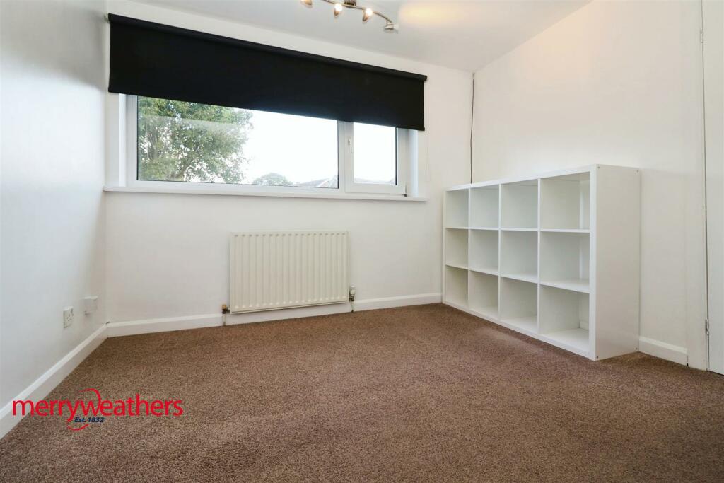 REAR BEDROOM
