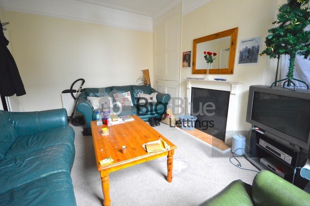 A cozy and inviting living room featuring comfo...