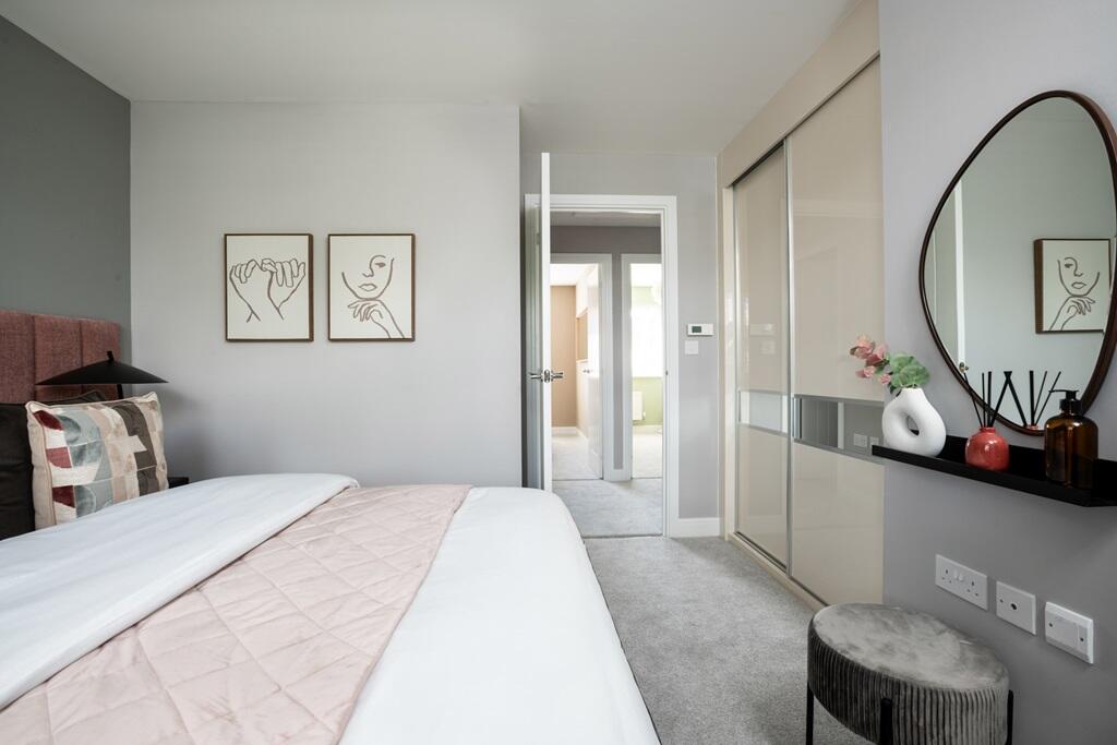 The main bedroom includes built in wardrobes proving ample storage.