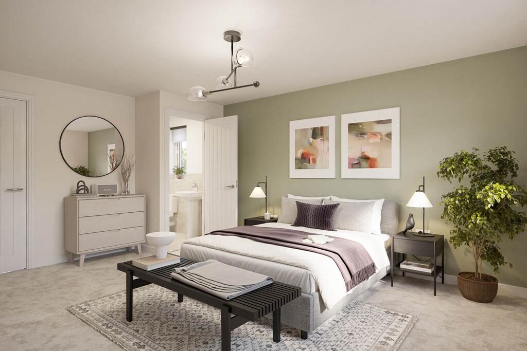 A spacious main bedroom complete with a private ensuite