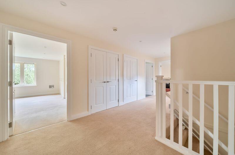 Spacious entrance hall with storage c...