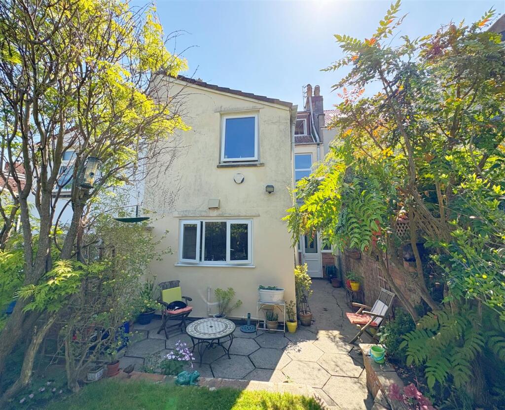 Rear view of property and patio.jpg