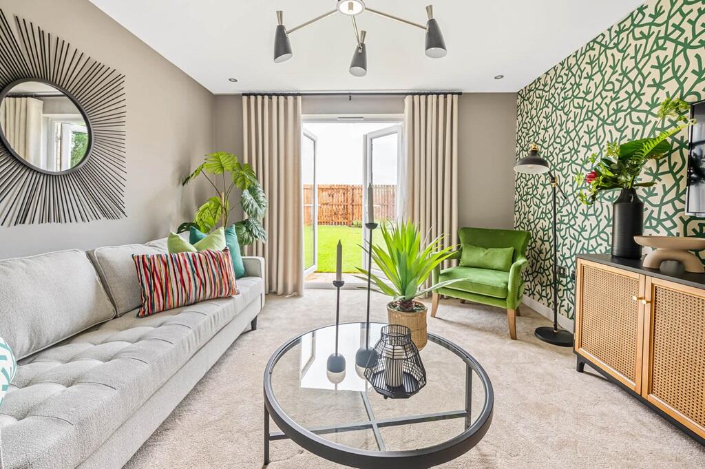 Step out into the garden from the lounge - typical Taylor Wimpey home