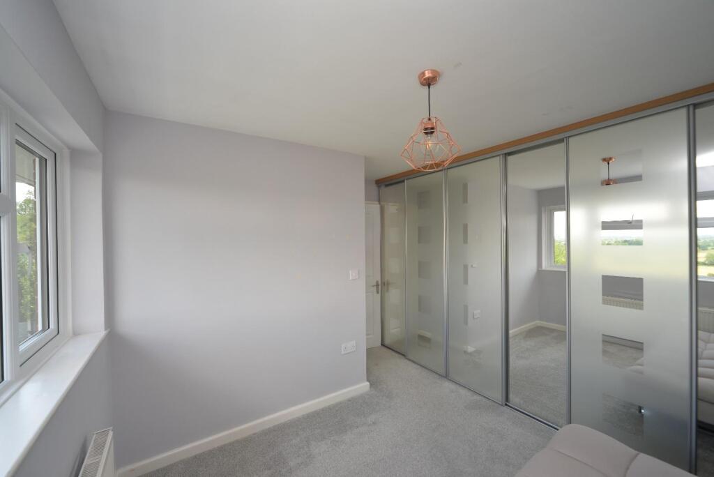 Bedroom Two 1 with Storage.jpg