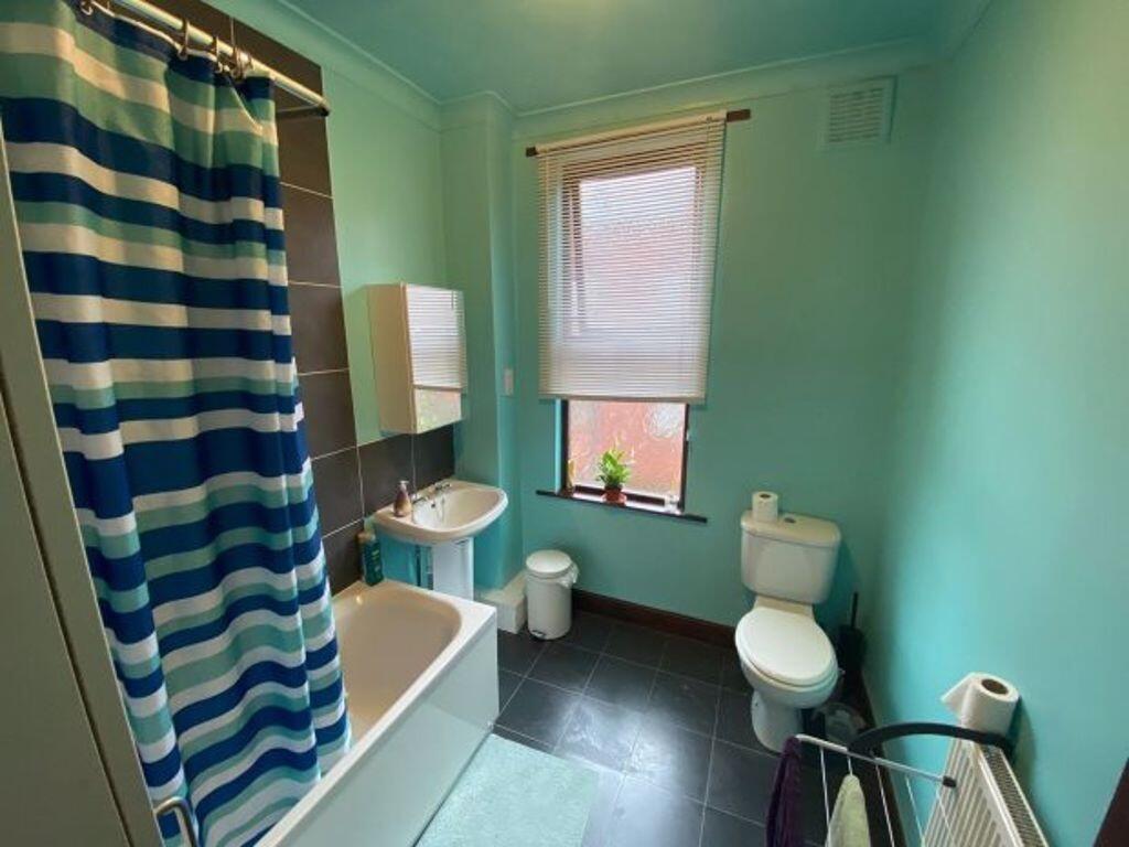 A neat and well-maintained bathroom featuring a...