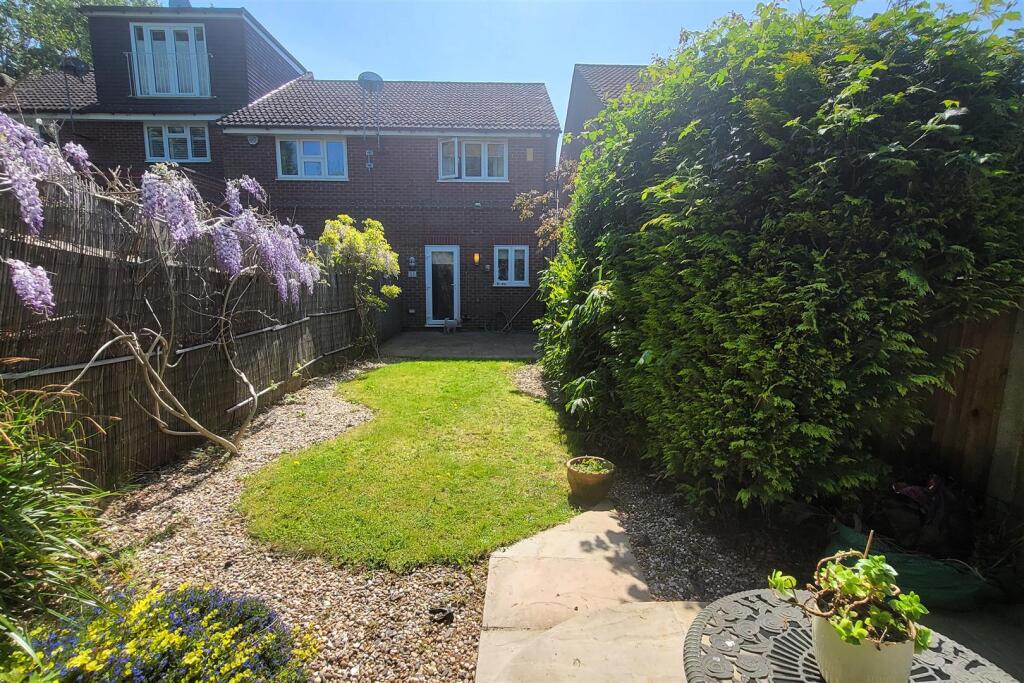 REAR ELEVATION OF PROPERTY: