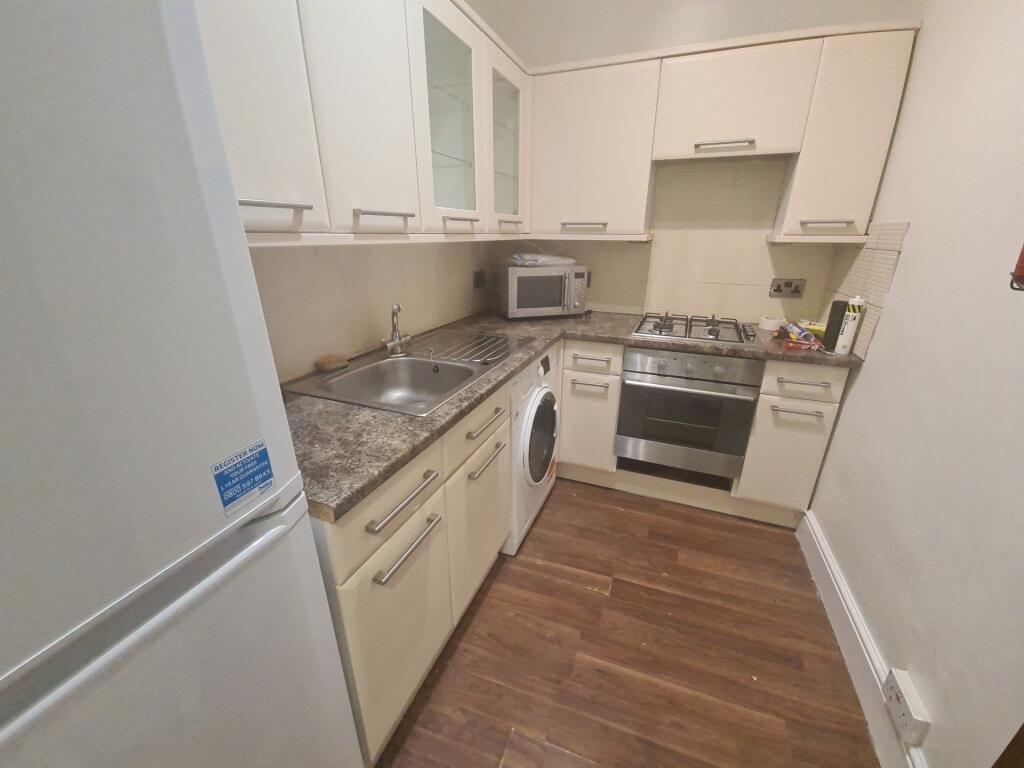 A modern, well-maintained kitchen area featurin...