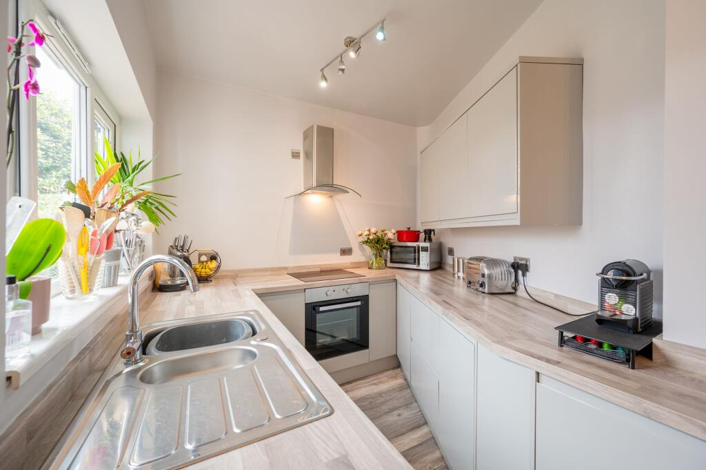 SITTING ROOM DINING ROOM AND KITCHEN