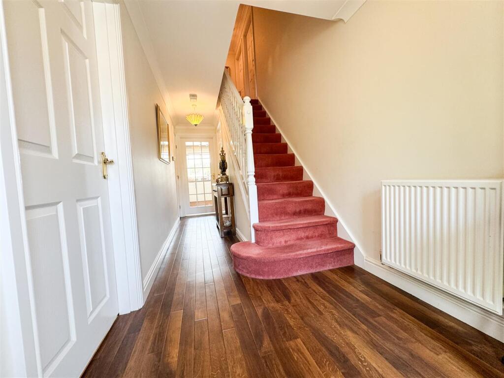 STAIRS RISING TO THE FIRST FLOOR