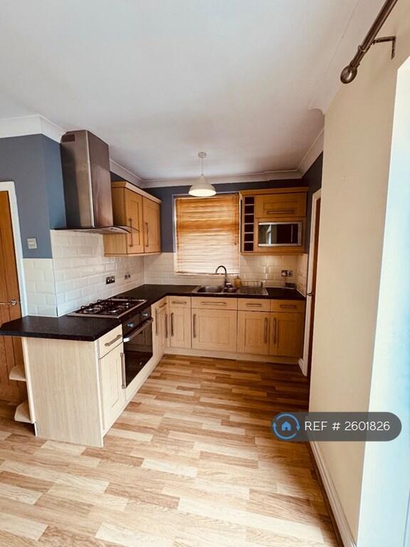 Kitchen With Inbuilt Oven And Microwave