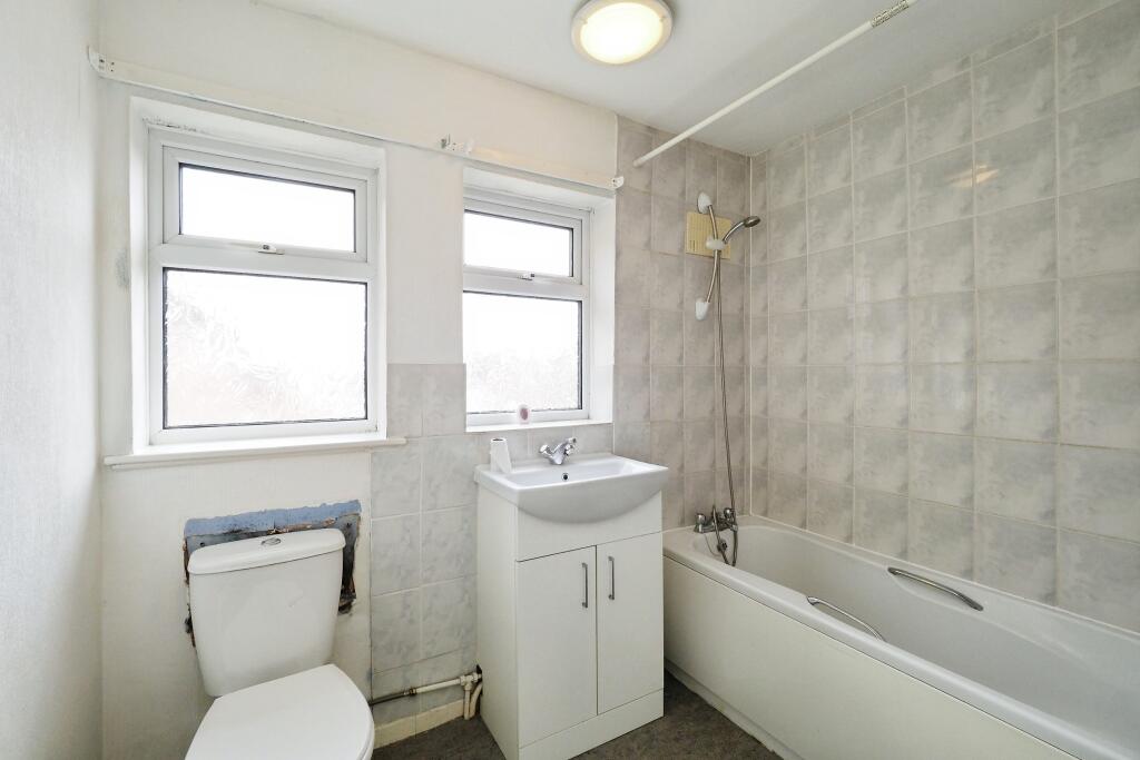 Main Bathroom - new cistern meaning paint needed around back of toilet