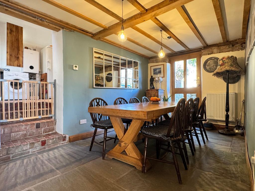 Dining area &amp; steps to utility/dog room