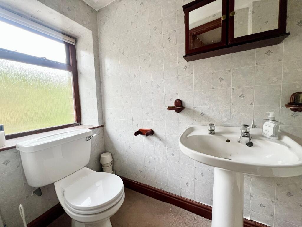 BEDROOM ONE EN-SUITE WC