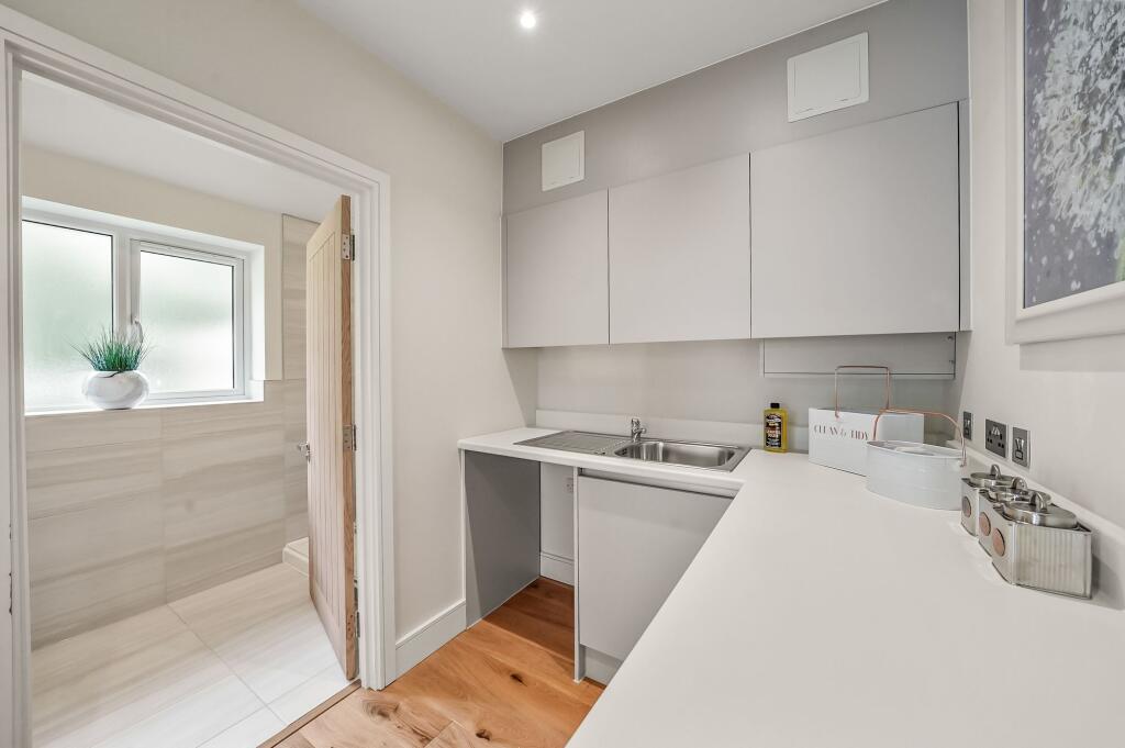 Utility Room to Downstairs Shower Room