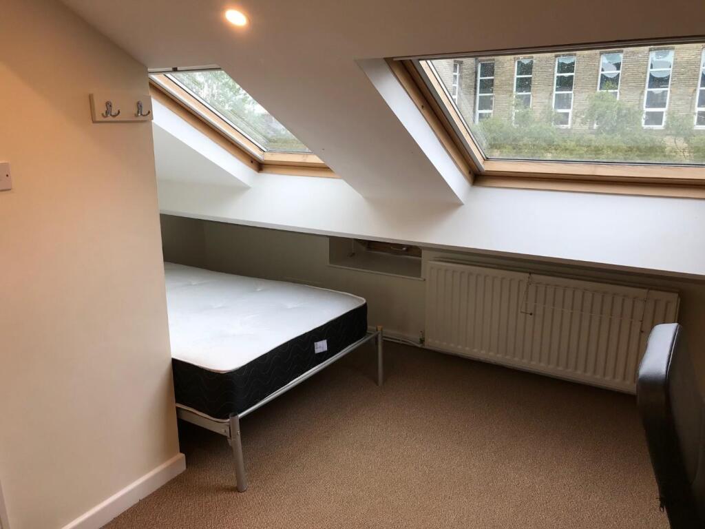 Attic rear bedroom bed.jpg