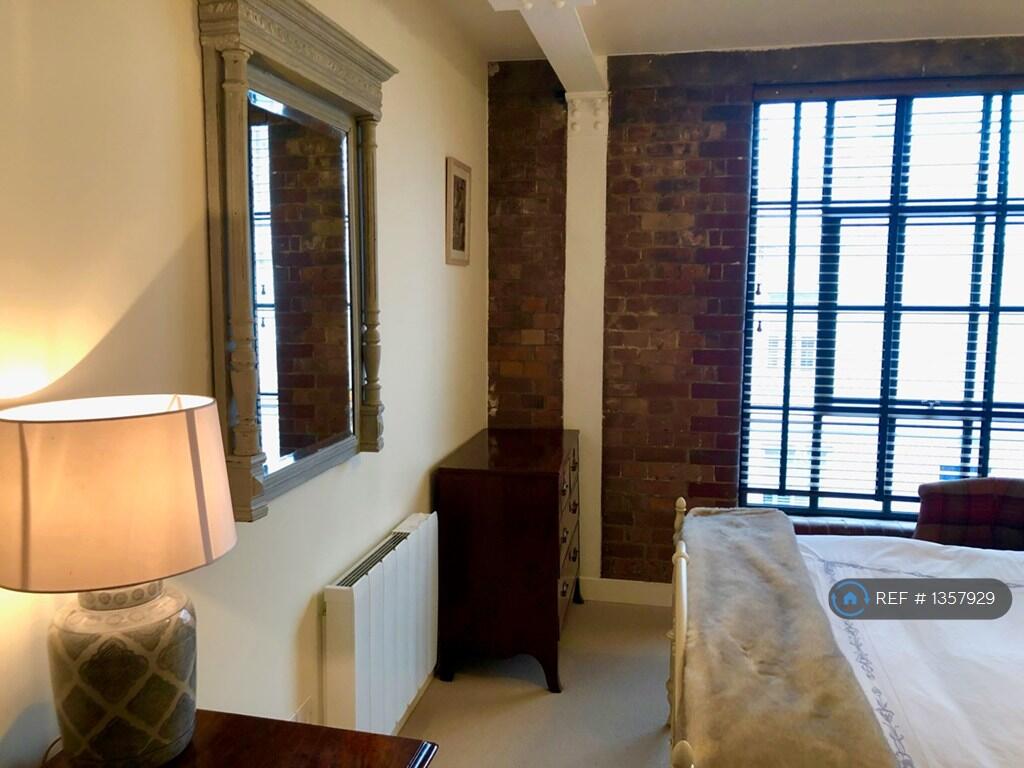 Exposed Red Brick Exterior Wall