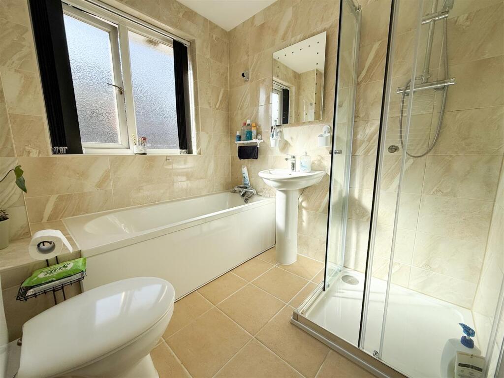 FAMILY BATH AND SHOWER ROOM