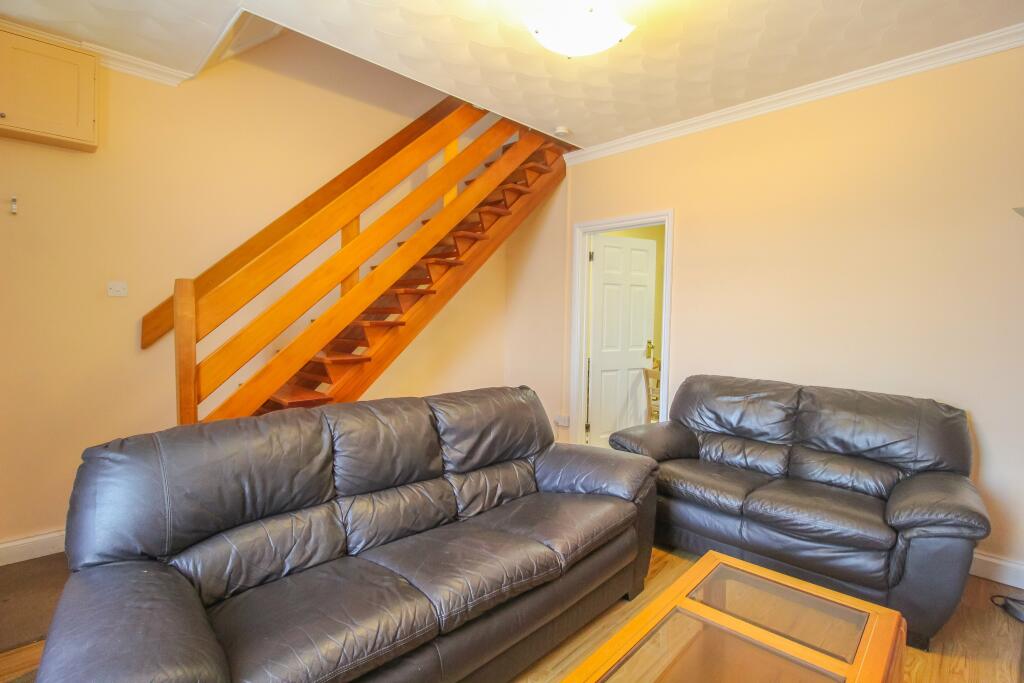 Living room with sta