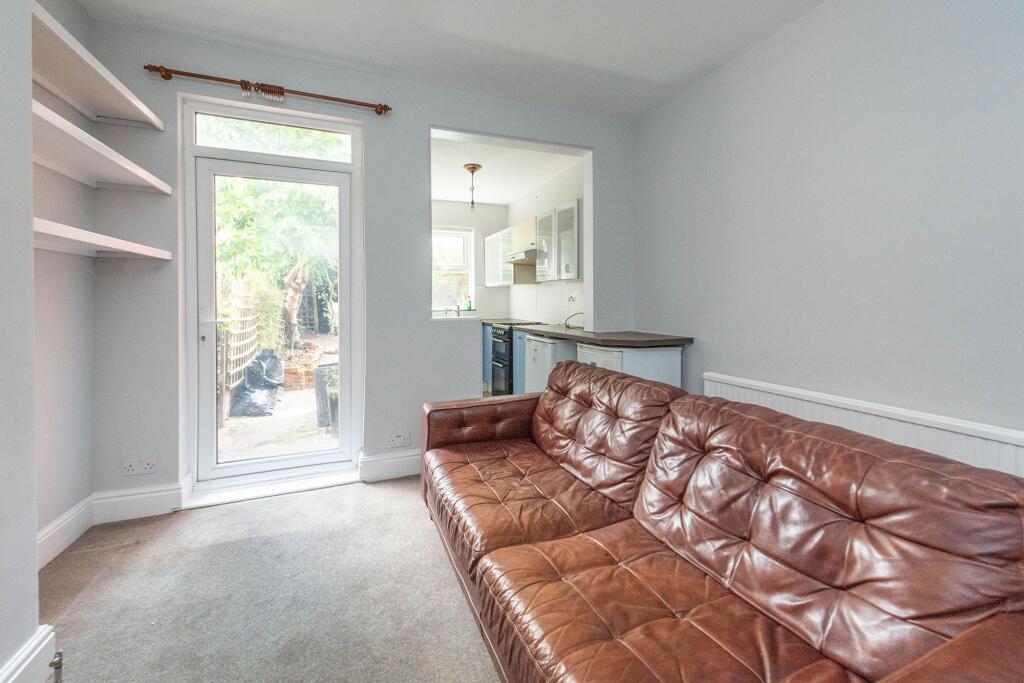 SITTING ROOM DINING ROOM AND KITCHEN