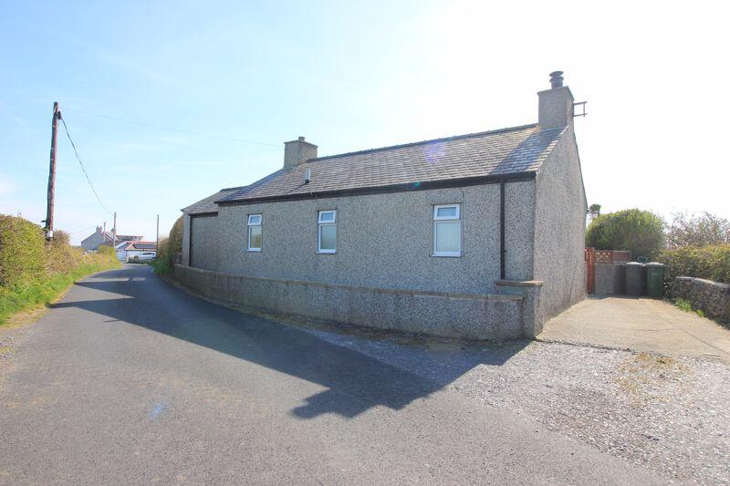 rear and country lane with parking