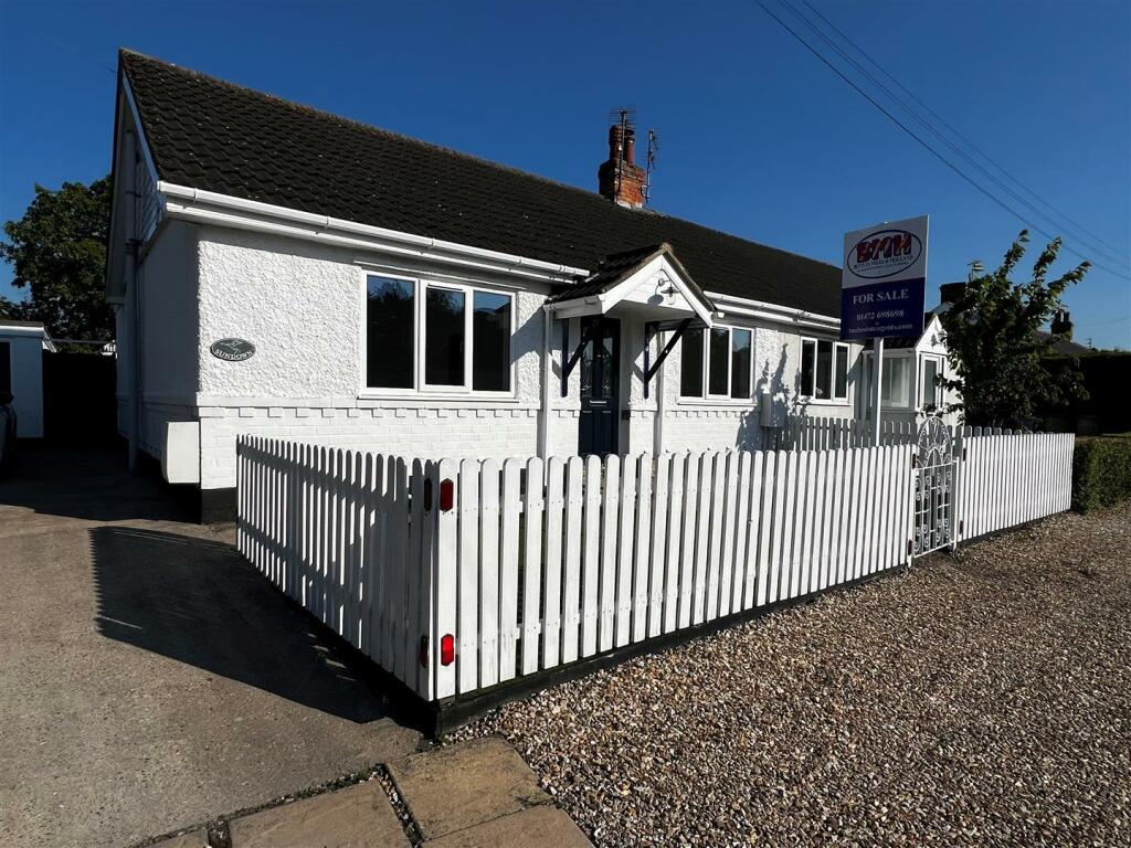 DIFFERENT VIEW OF THE FRONT