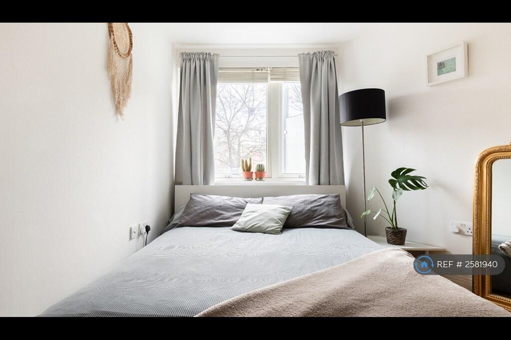 Large Bedroom With a Spacious Built-In Wardrobe