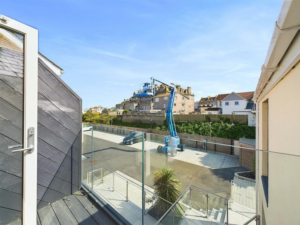 Rear Balcony and Car Park