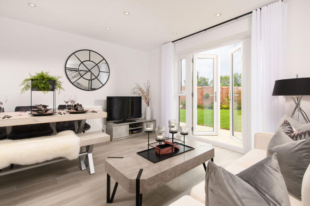 Kingsville 4 bed home kitchen/diner/family area with French doors onto the garden internal