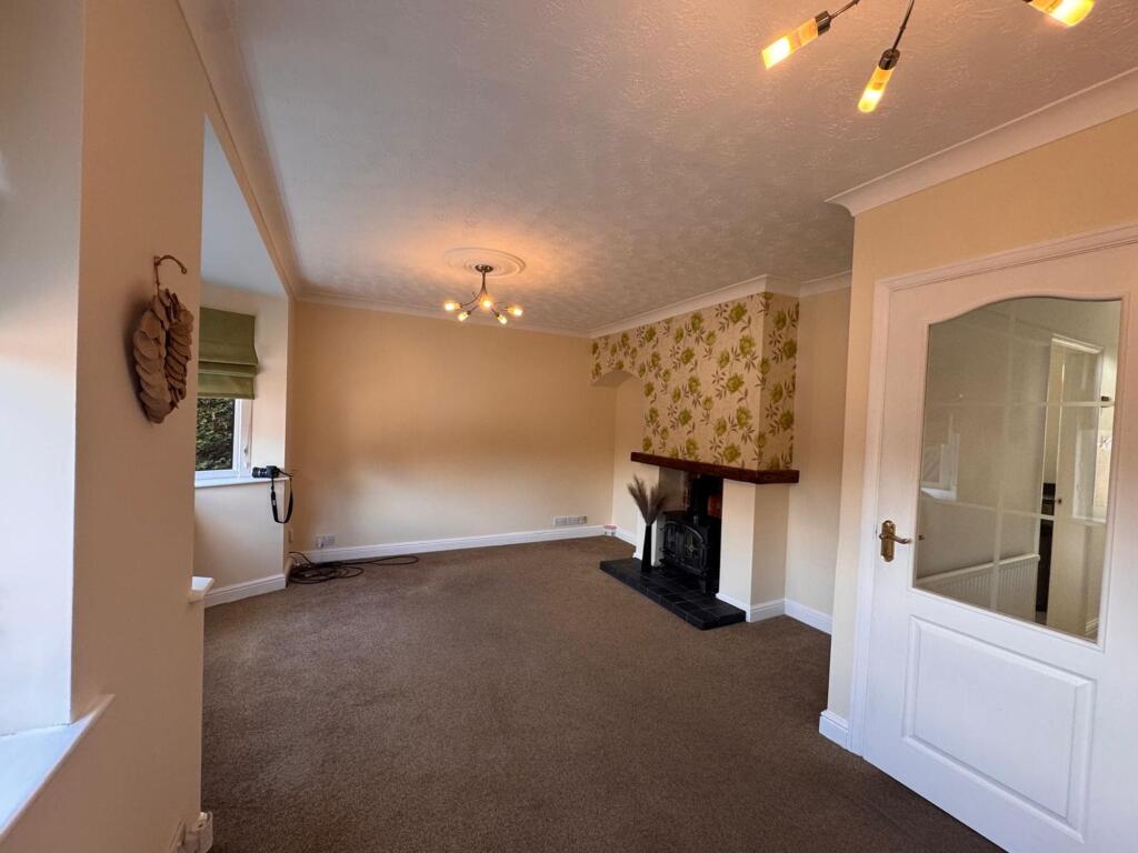 SITTING ROOM KITCHEN AND CONSERVATORY