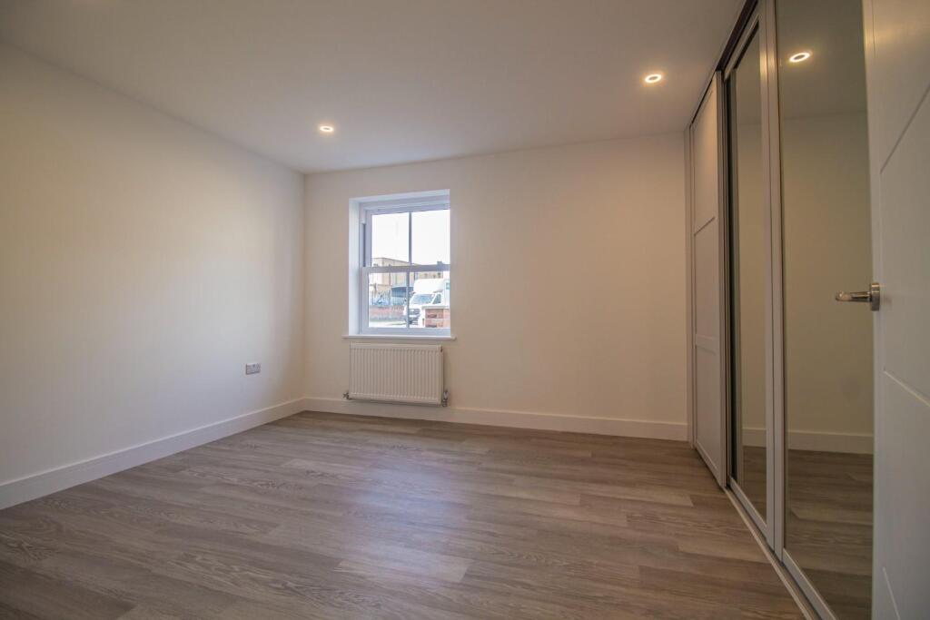 Apartment 1_Saddler's Court [Bedroom One] 01.jpg