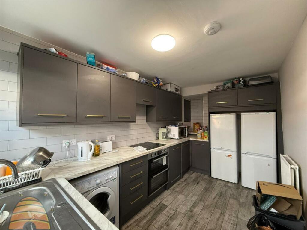 A modern and functional kitchen equipped with e...
