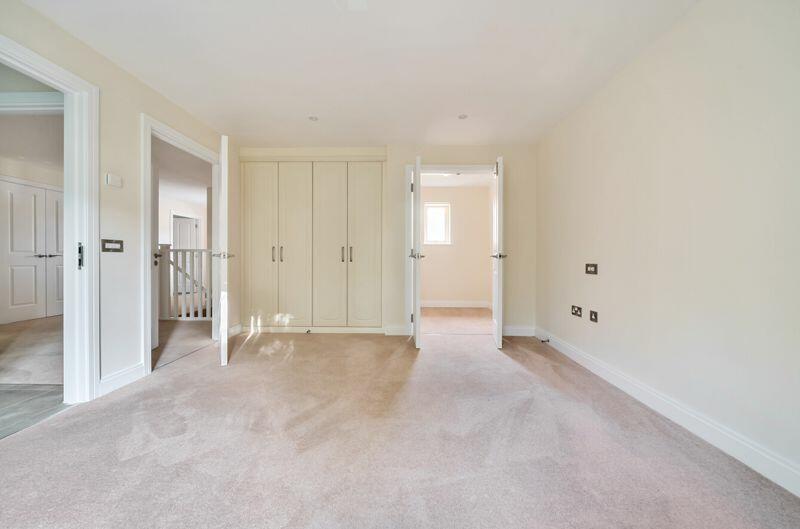 Second bedroom with walk-in wardrobe/...
