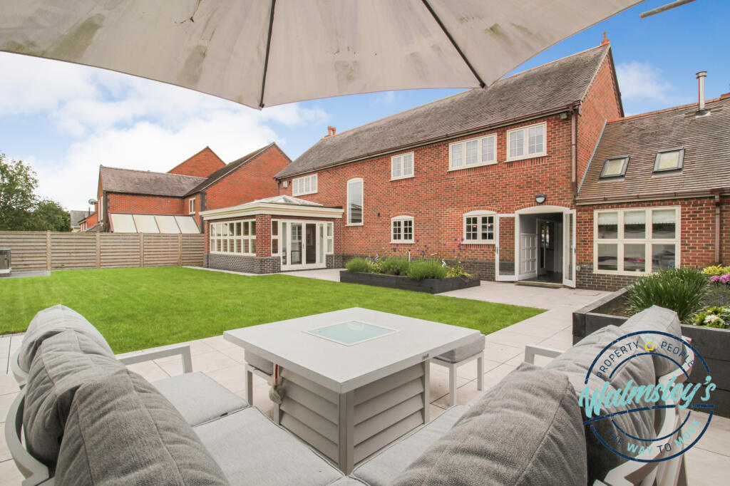 Rear elevation and patios