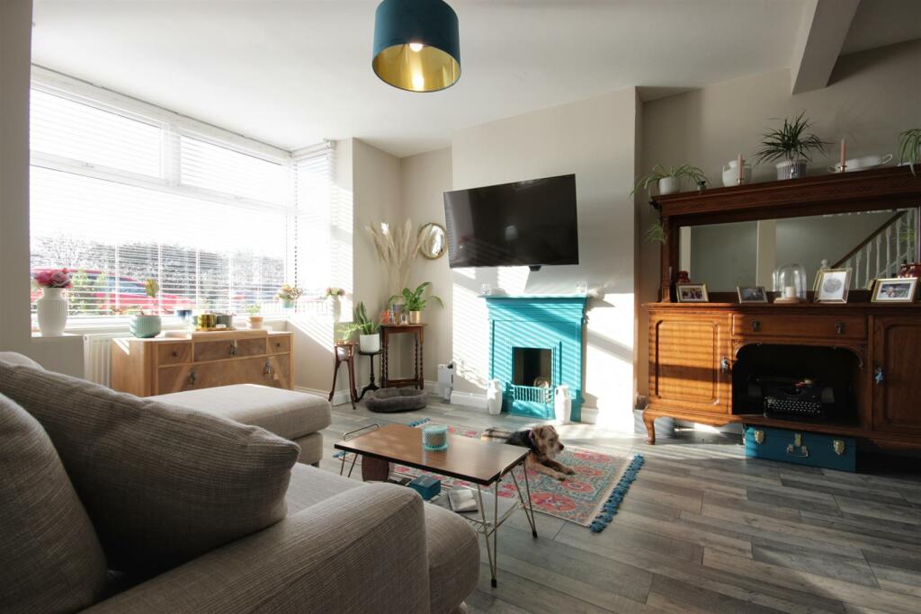 THROUGH LOUNGE AND DINING ROOM