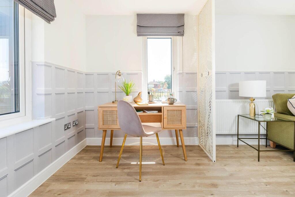 The spacious lounge also offers a dedicated space for home working