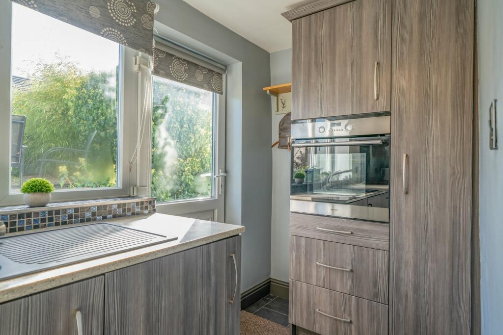 Kitchen With Patio Access