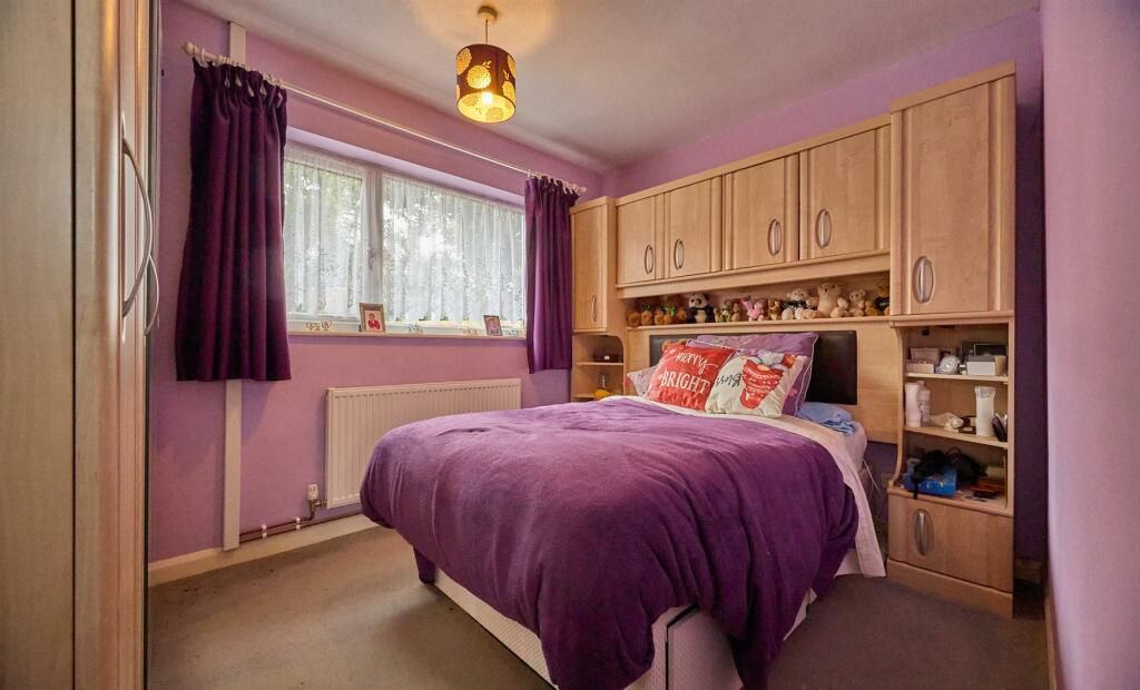 BEDROOM ONE TO REAR