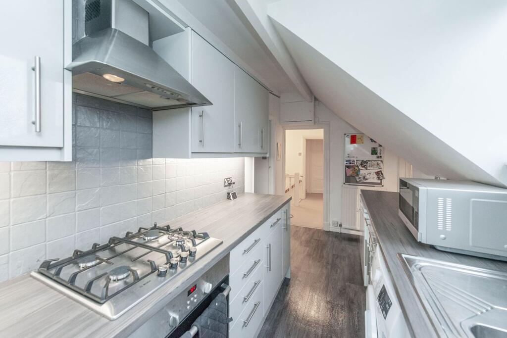 SITTING ROOM AND KITCHEN