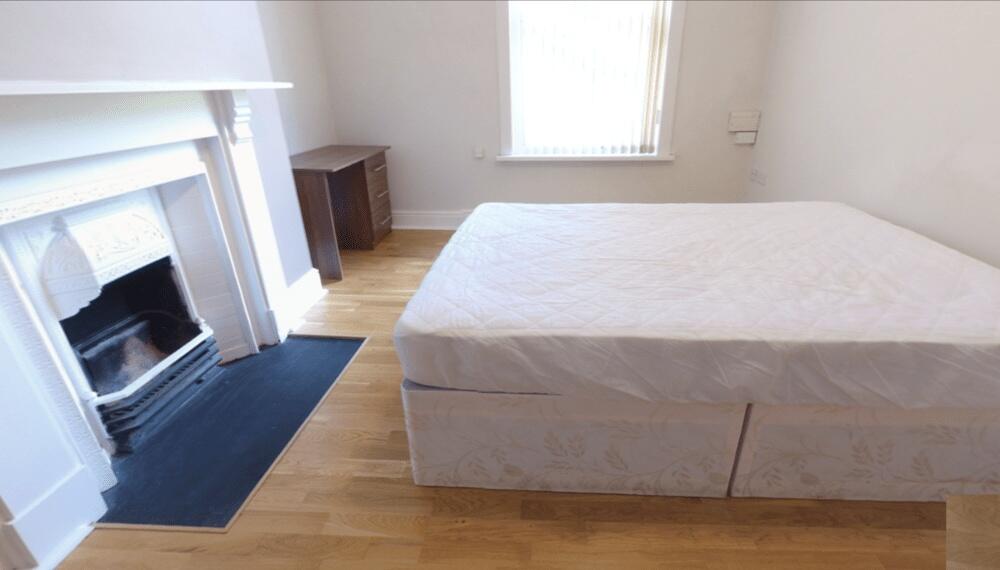 A spacious and well-maintained master bedroom f...