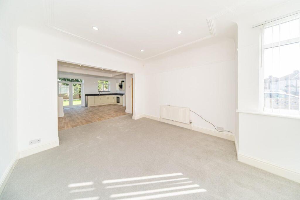 77 Jeffereys Crescent lounge and kitchen.jpg