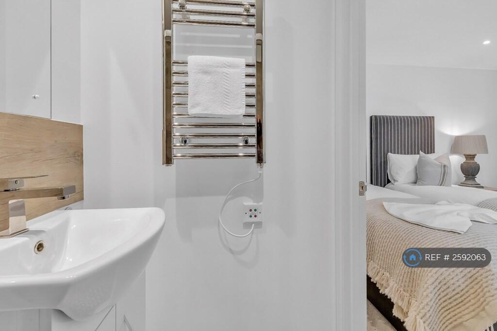 Bathroom With Shower And Toilet, Basin And Mirror