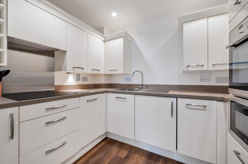 Kitchen with built-in appliances